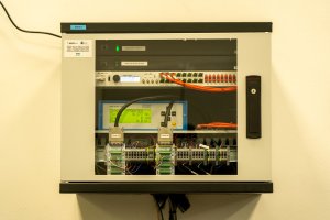 Drive Test Bench System for Hardware Simulation of Interaction Between a Drive/Source and the Power Grid